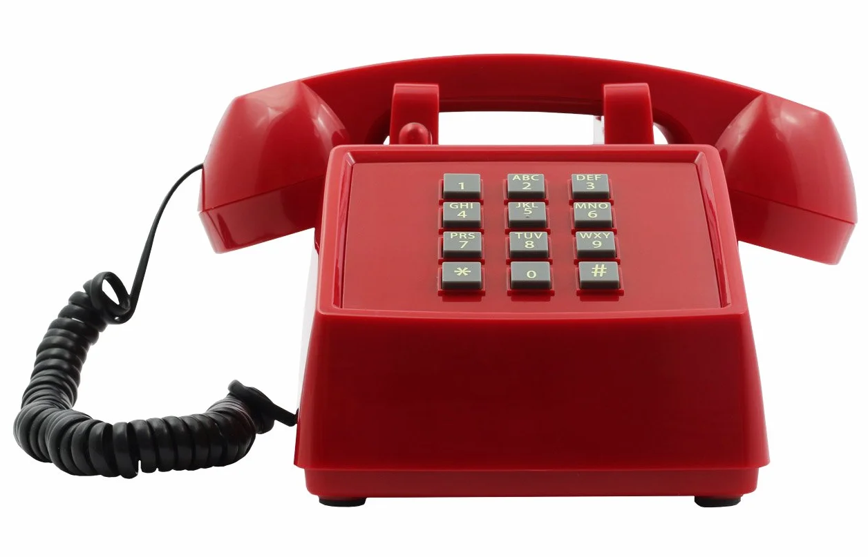OPIS PushMeFon Cable: Telefon retro z lat 70. w nowoczesnych kolorach z metalowym dzwonkiem (czerwony)