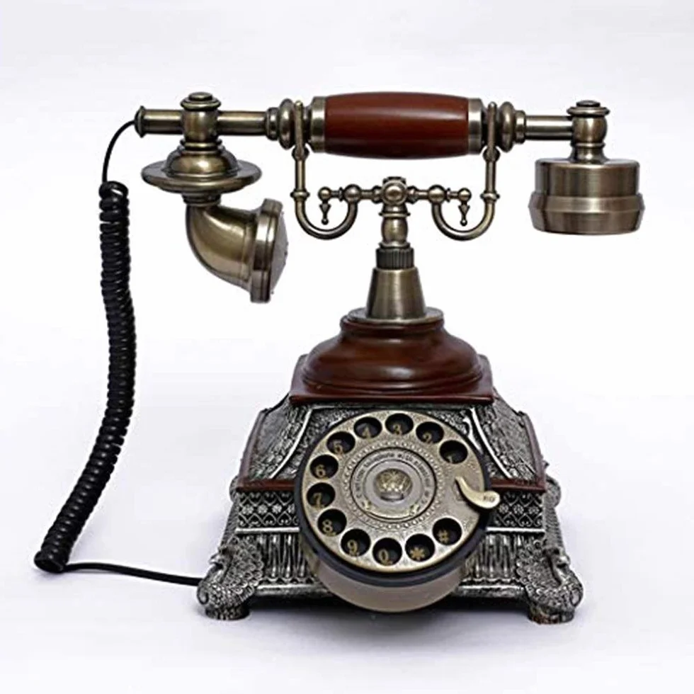 Telefon retro, zabytkowy telefon z tarczą obrotową, funkcjonalny, retro, staromodny, z klasycznym metalowym dzwonkiem, telefony stacjonarne do domu i wystroju wnętrz